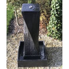 Satu Bumi Twisted Column with Pond Water Feature